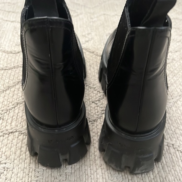 Prada Monolith Leather Lug-Sole Chelsea Booties - Picture 8 of 8